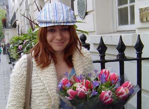 Alyson holding the bunch of flowers